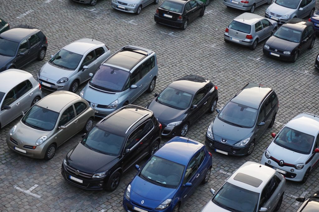Aerial view of cars parked in rows