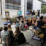Image of parents and children at a Community Day 22 at Falmouth Campus