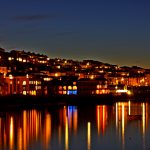 Nighttime view of Falmouth across the harbour