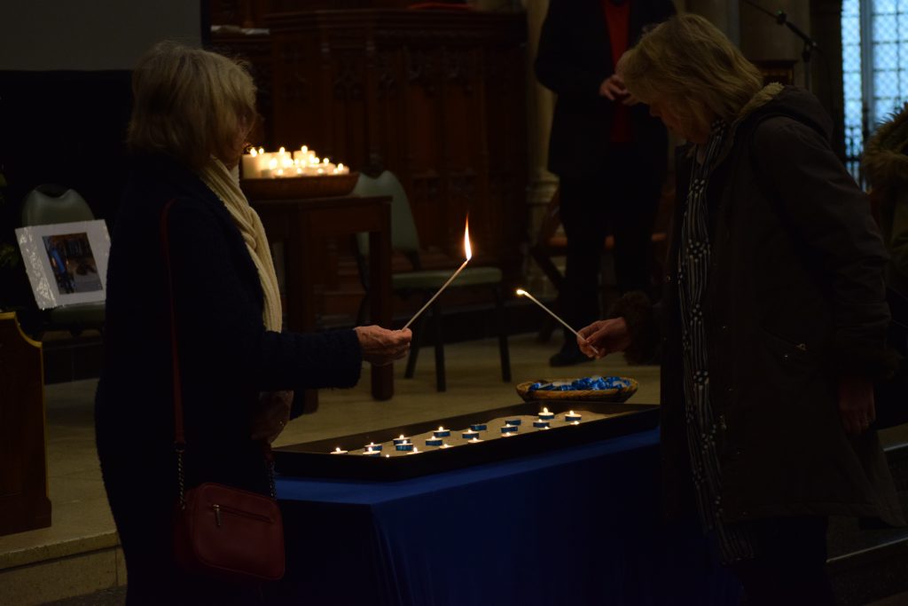 Photograph of the candle lighting ceremony held at Truro Cathedral to mark Holocaust Memorial Day 2025. Photograph by Danielle Hutchinson.