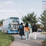 Students walking to bus stop at Penryn Campus